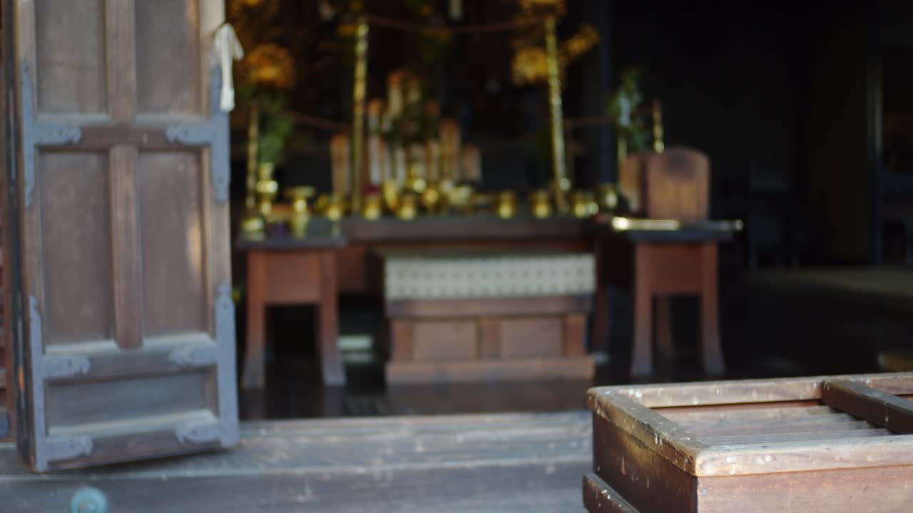 Entrance to a Traditional Japanese Temple with Golden Altar Objects