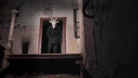 goat mask in an abandoned building