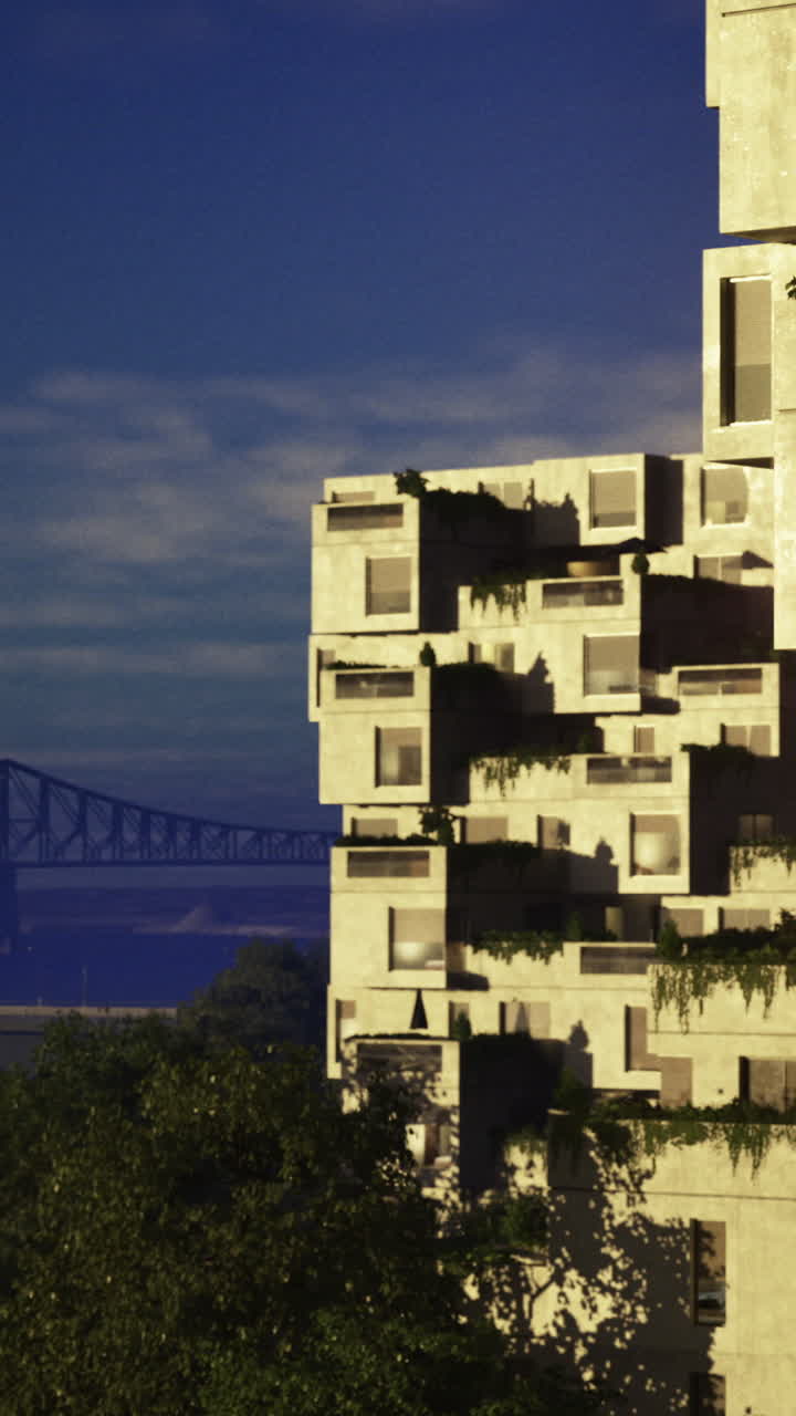 Edifício moderno com elementos verdes e ponte ao fundo durante o dia