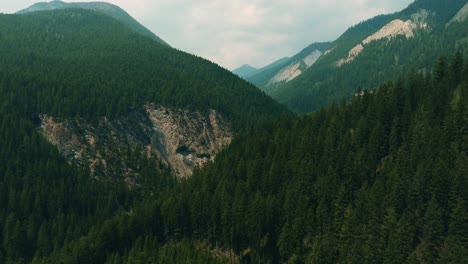 Drone-shot-Rocky-Mountains-in-Banff-National-Park-with-smoke-from-wildfire