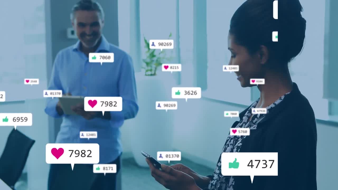 Animation of media icons over diverse business people in office