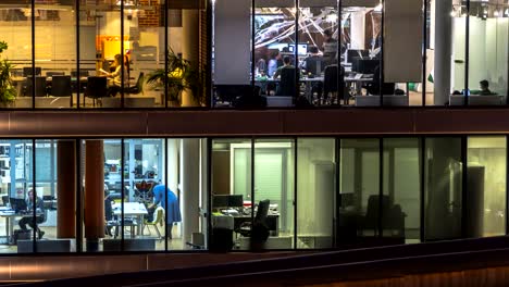 creative office workers during operation and at the end of working day, time lapse