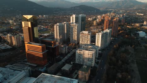 aerial view of las condes high rise buildings near araucano park in santiago, chile, south america