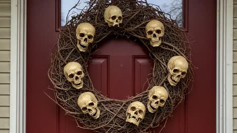 a spooky skull wreath decoratively adorning a dark red door, perfect for halloween, merging nature and macabre aesthetics in a unique home decoration