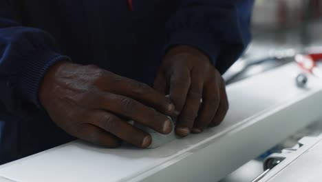 Close-Up-Slow-Motion-of-Hands-Drilling-in-an-object