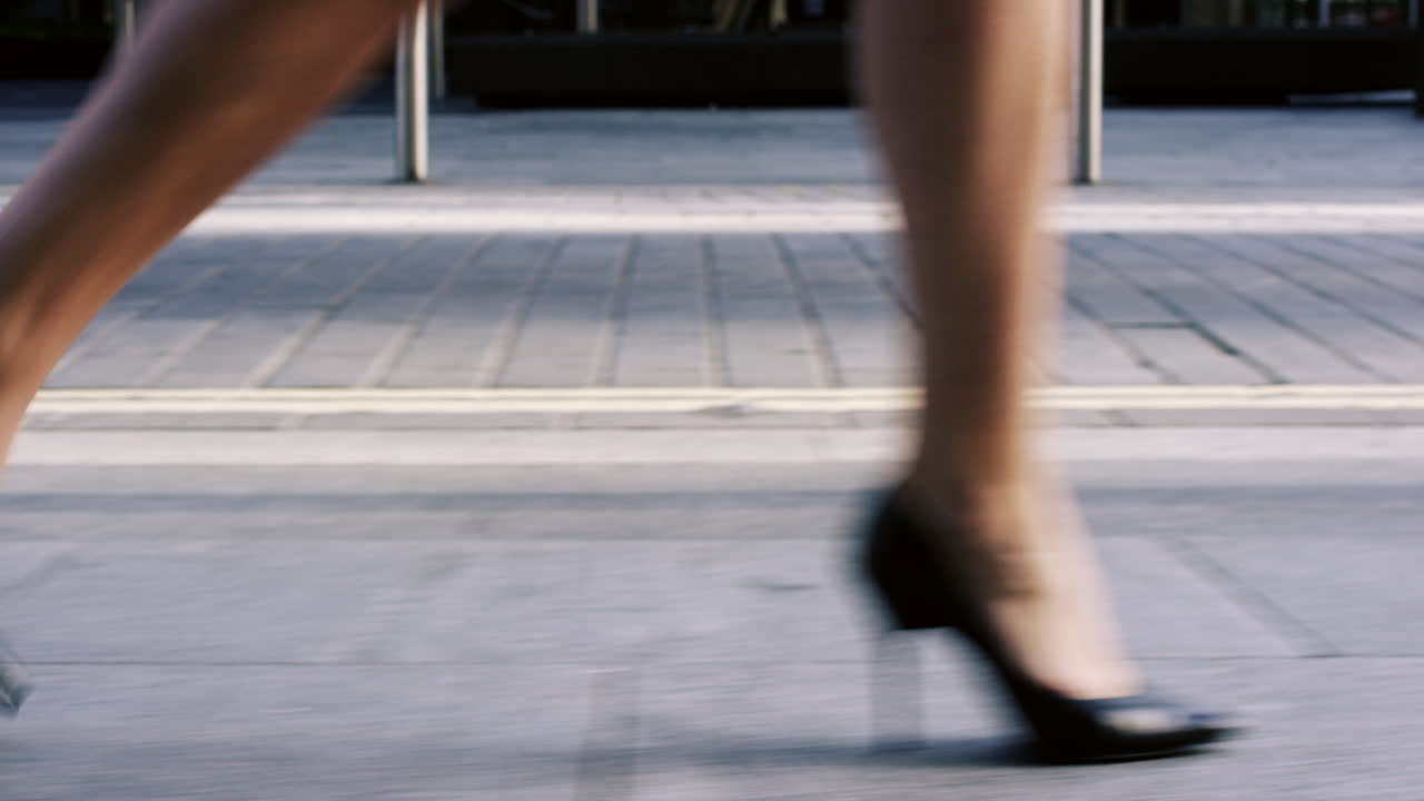 The sound of her heels clicking