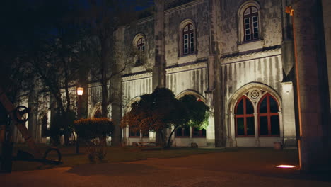 historical building illuminated night in urban city. european architecture