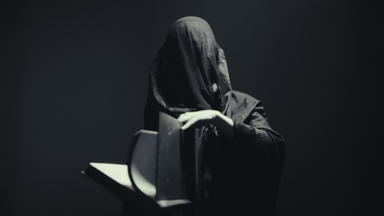 Mysterious Figure with a Book