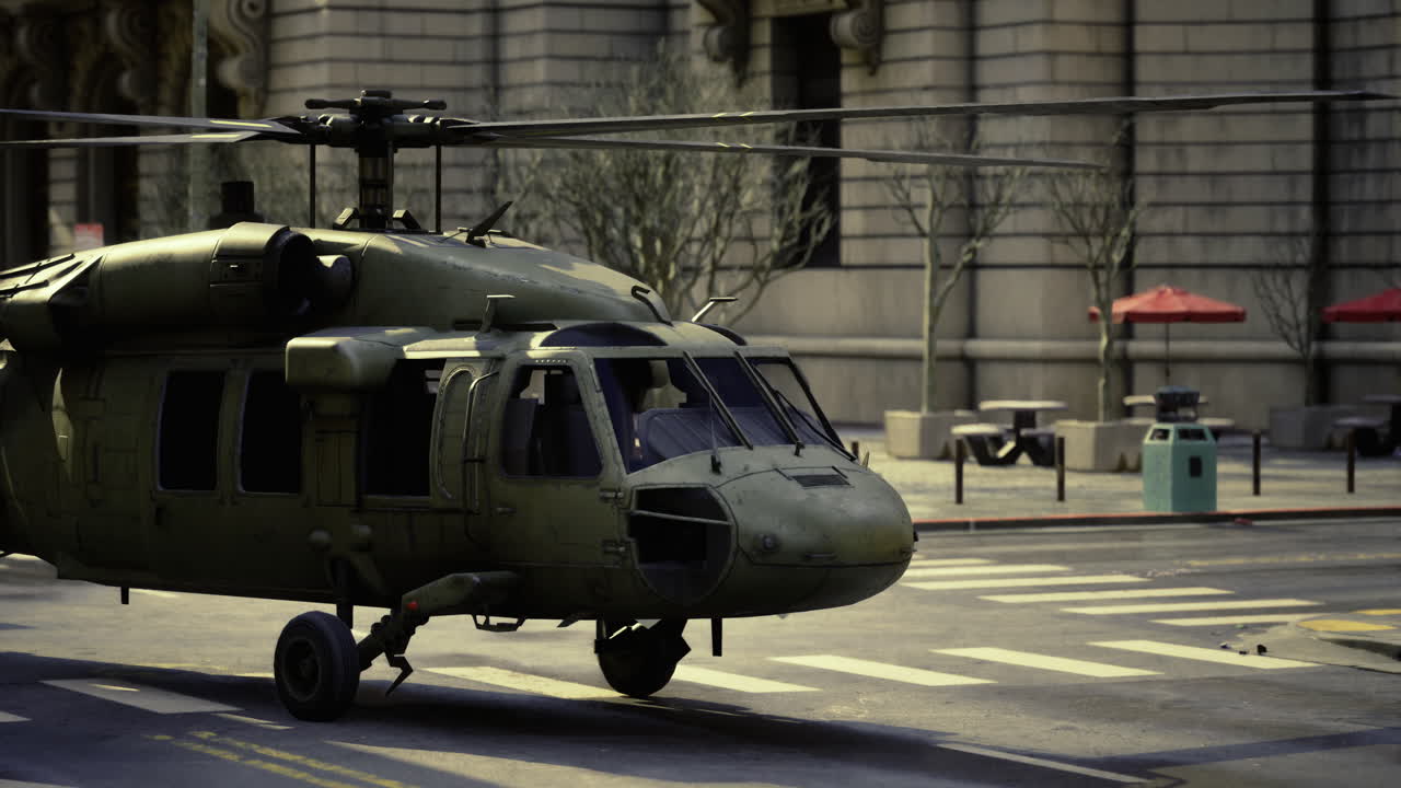 Military helicopter hovering in an urban landscape on a sunny afternoon