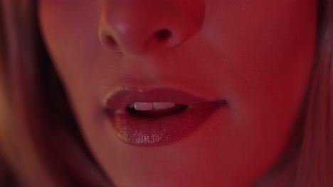 young woman bites her lips and is excited close up