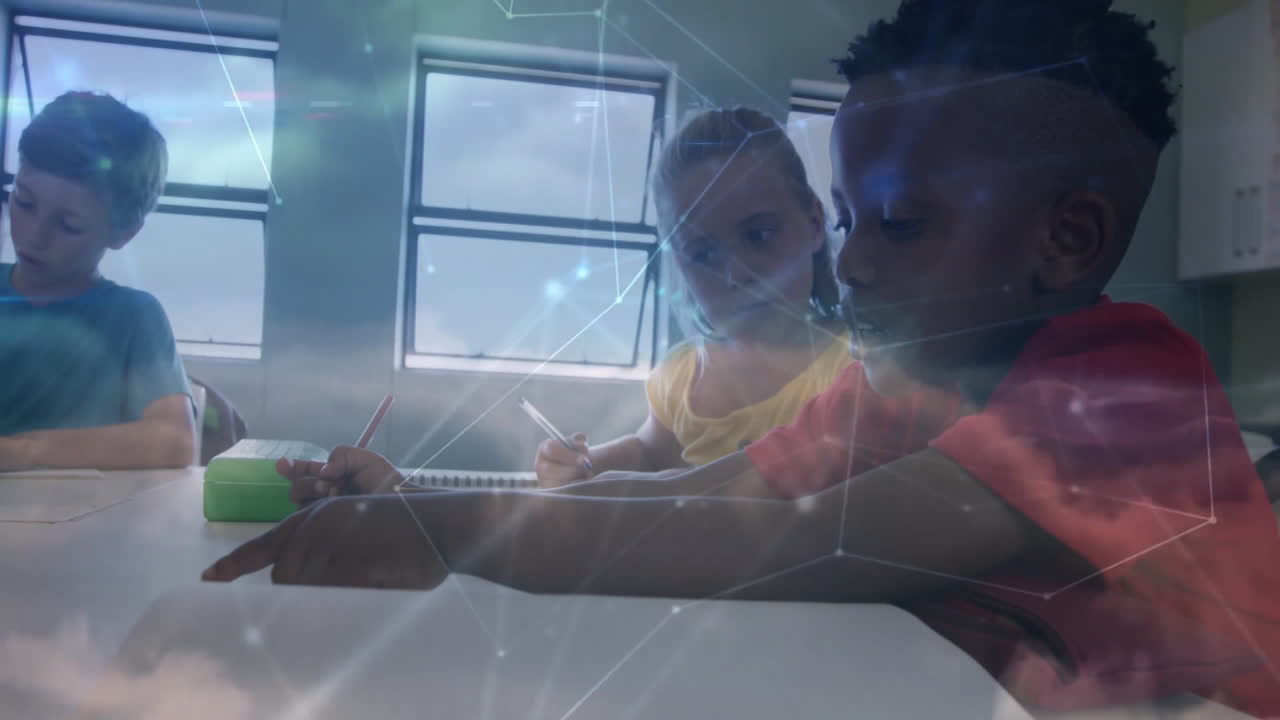 Students sitting at school desk writing with pencil on paper, digital network lines linking ideas