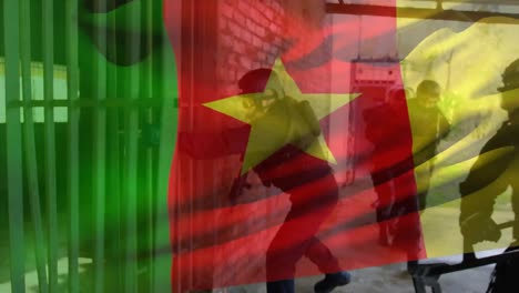 Animation-of-flag-of-cameroon-over-diverse-male-counter-terrorists-with-weapon