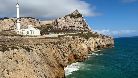 the scenic view of ibrahim-al-ibrahim mosque and the profile of gibraltar rock from europa point.