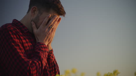 close-up of sad farmer's face