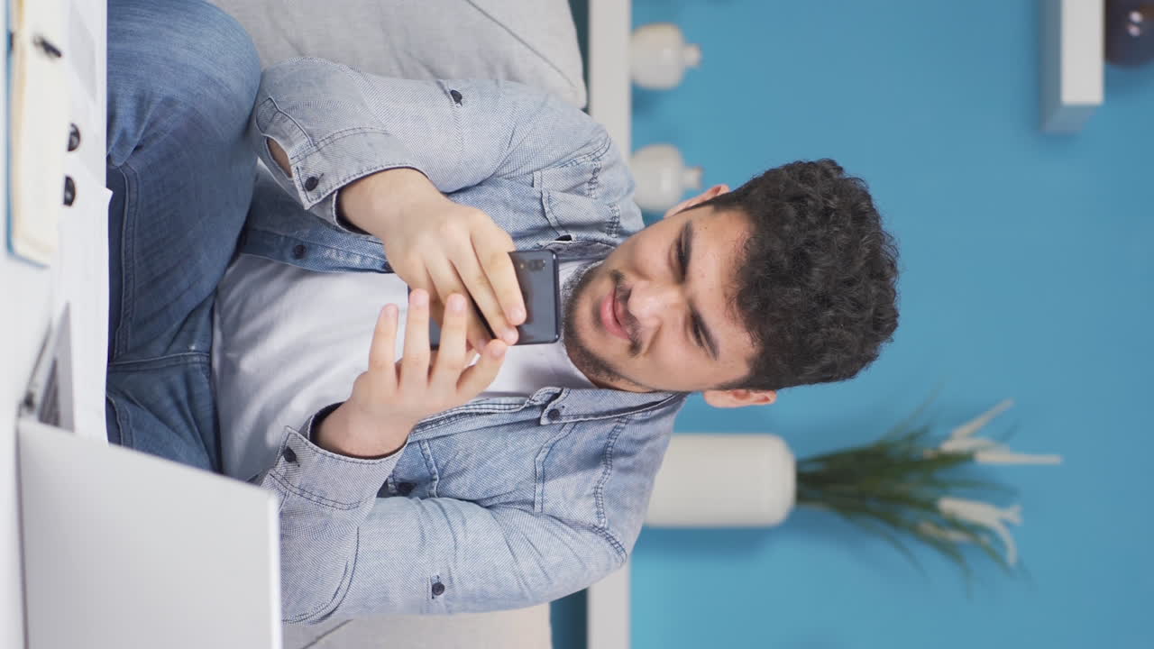 Vertical video of Sad man is crying.