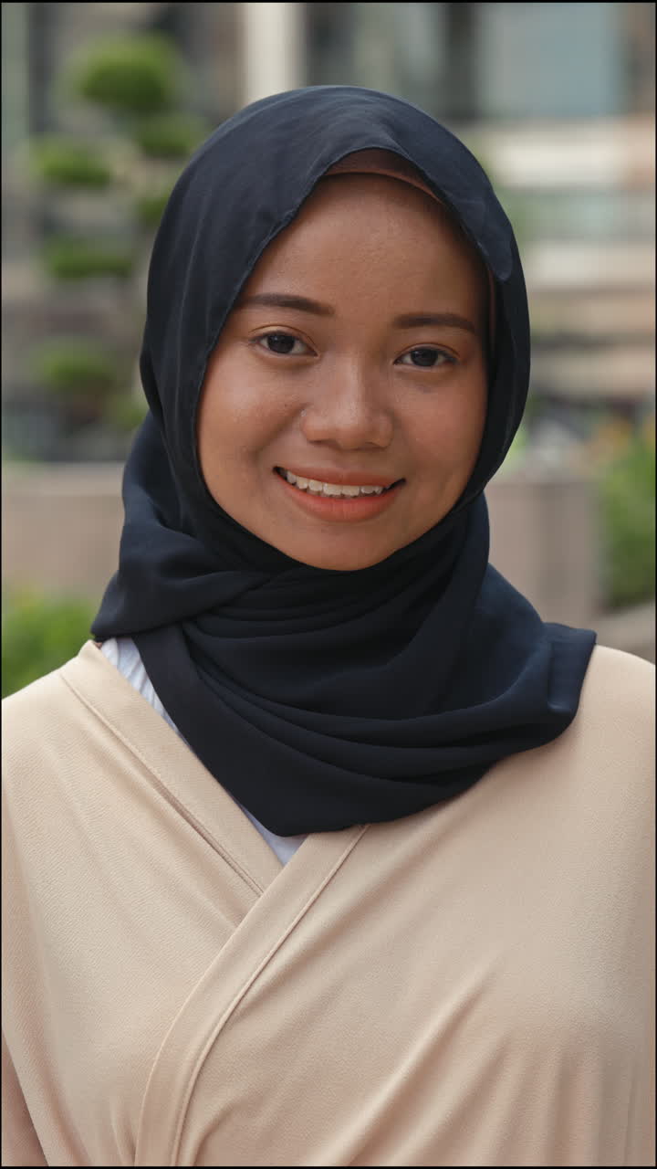 Portrait of a Smiling Woman in Hijab | Premium Stock Video Footage