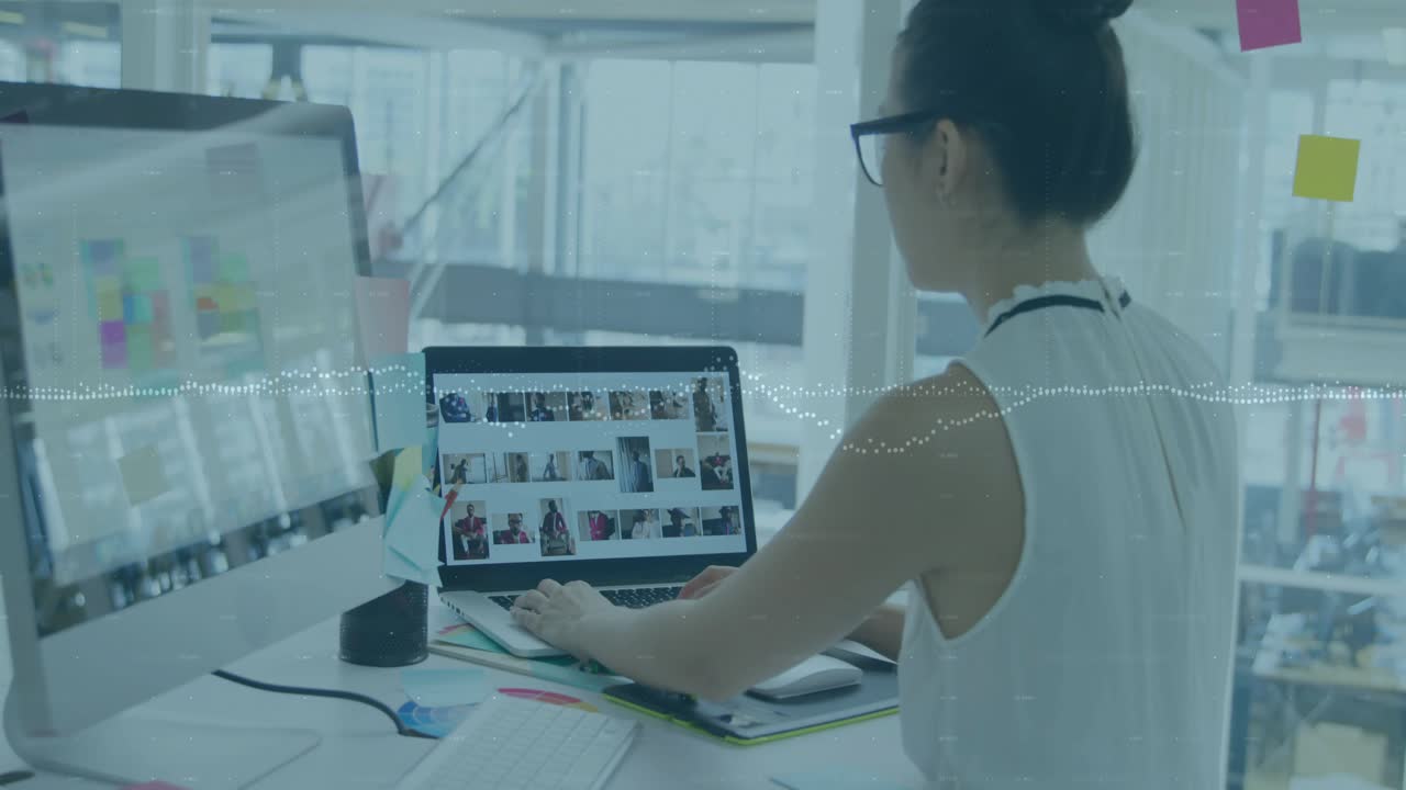 Designer clicking desktop UI and shifting to laptop trackpad, scrolling thumbnails, typing filters