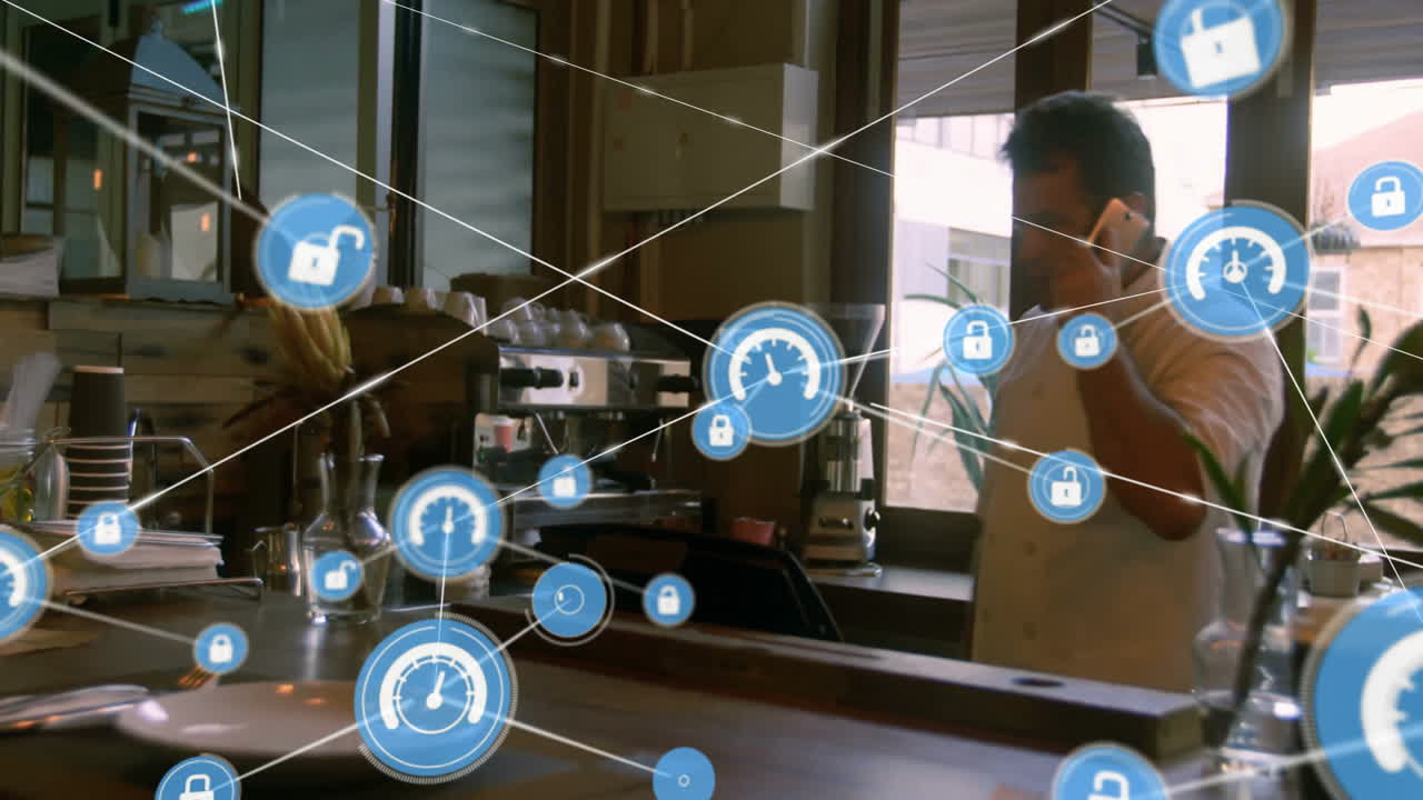 Network of connections and security icons animation over man talking on phone in cafe