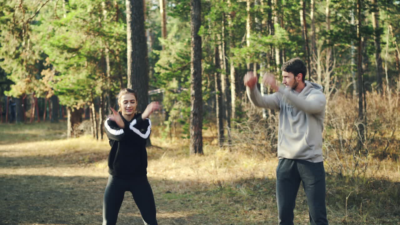 Couple Exercising in the Forest