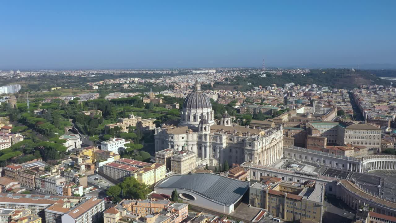 Drone footage glides above the Vatican, showcasing the dome of St. Peter’s Basilica and the iconic square in Rome, Italy