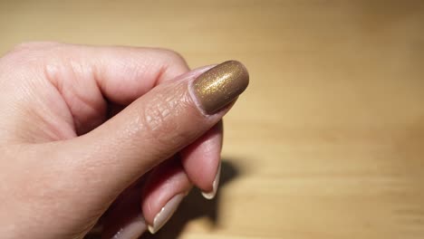 sequential application of nail polish on fingernail