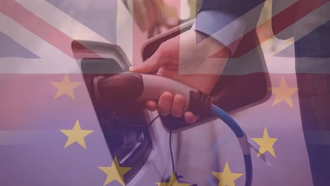 Flagge-Von-Großbritannien-Und-Der-Europäischen-Union-über-Mann,-Der-Ein-Elektroauto-Lädt