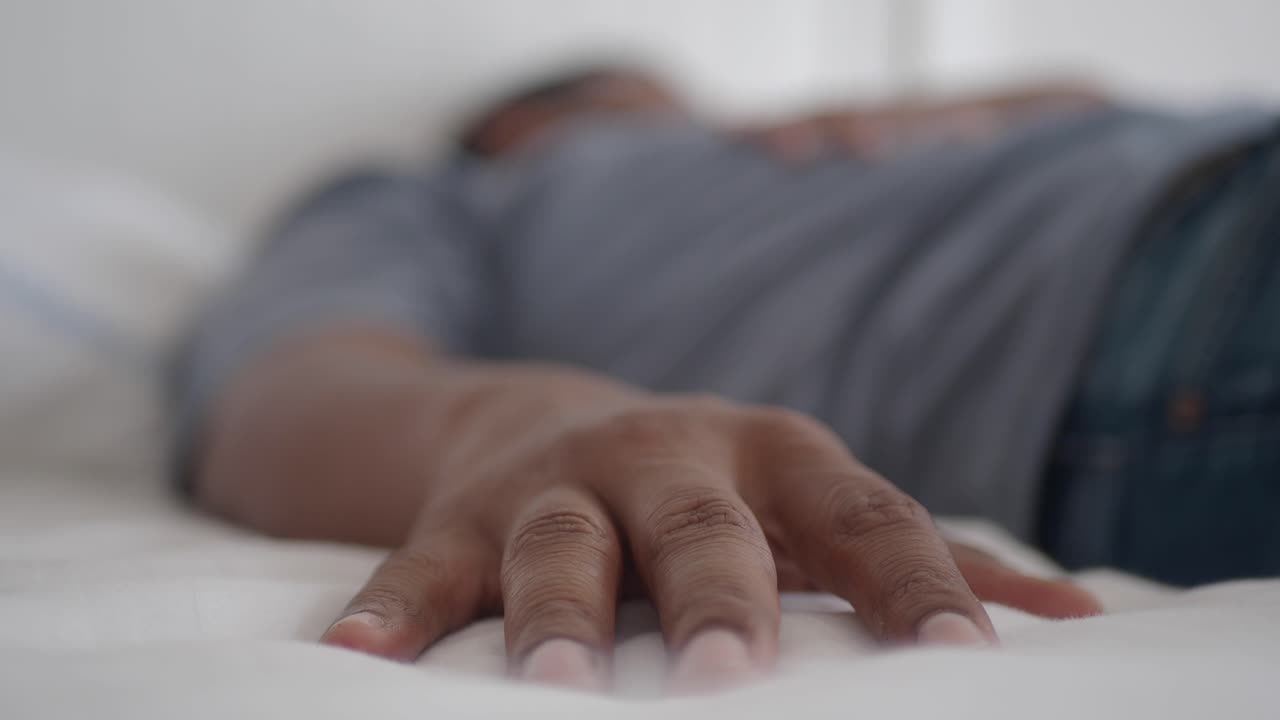Man Sleeping in Bed