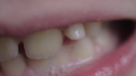 child having a loose tooth