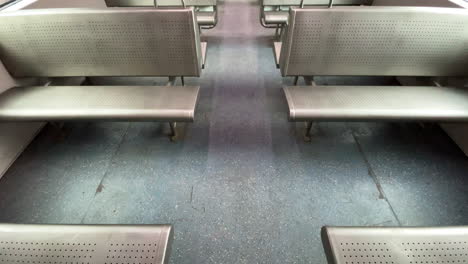 tilt up shot of empty mumbai local ac train india 4k