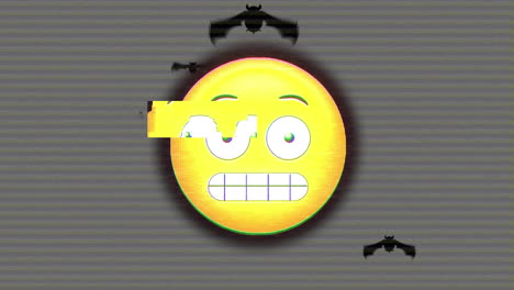 emoji de cara contra murciélagos volando en el fondo