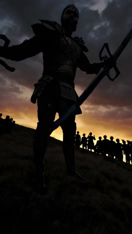 silhouette of a warrior and army at sunset