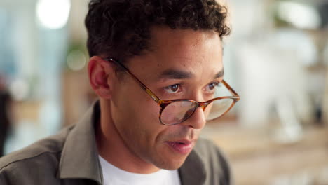 close-up of a man with glasses