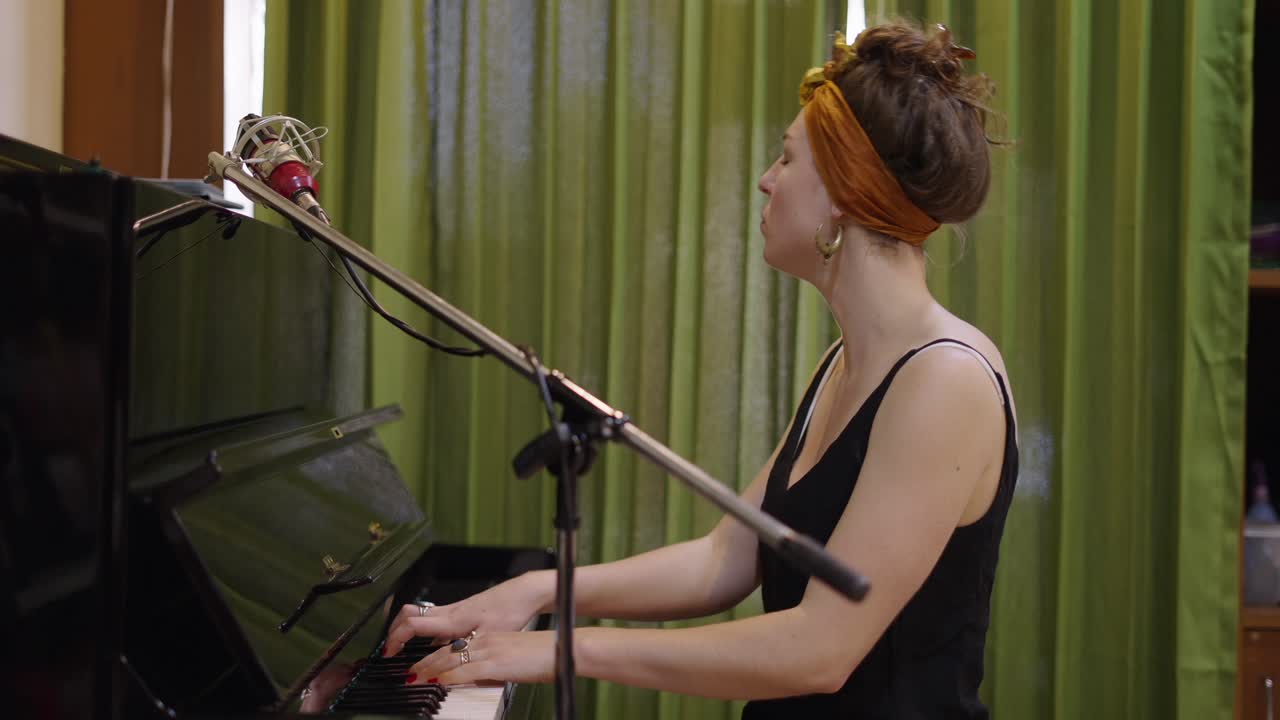 Woman Playing Piano and Singing