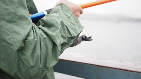 a person fishing on a lake