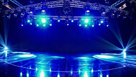 empty stage with blue lighting