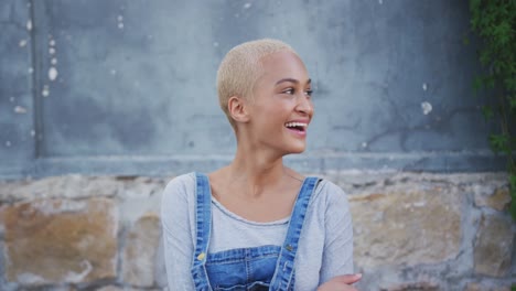 Mixed-race-woman-smiling-at-the-camera