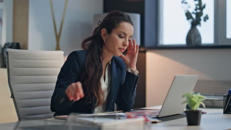 busy woman study documents creative office closeup. businesswoman typing laptop