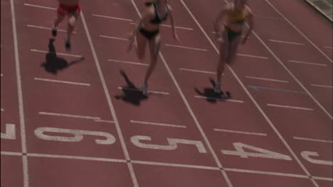 female racers reach the finish line