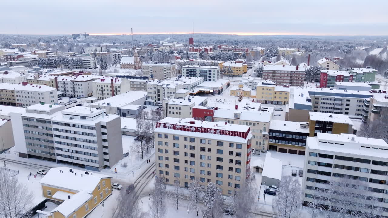 Aerial View of a Snowy City in Finland