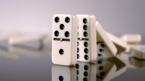 Dominoes-pushing-others-dominoes-down