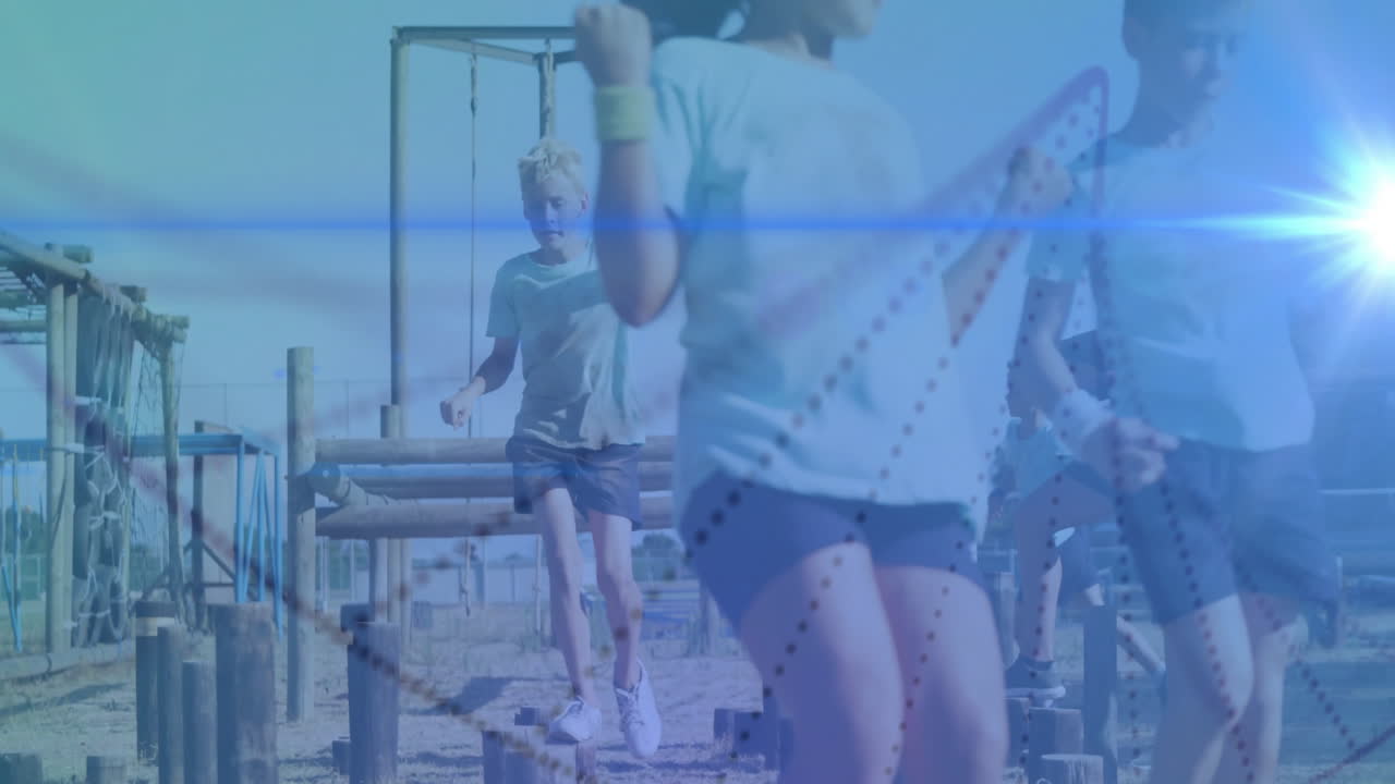 Running through obstacle course, children with blue light animation in school