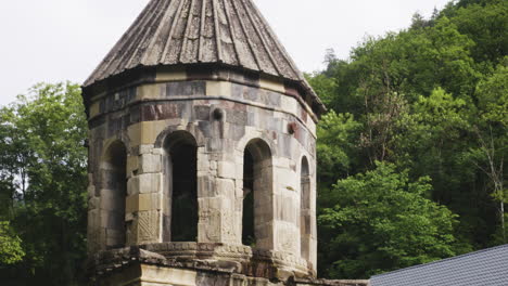 holy cross on roof of octagonal tower above mtsvane monastery church