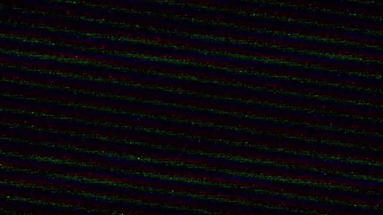 Authentic VHS tape noise with color bleeding, scan lines, and static glitch effects. Seamless loop for creating a retro 80s or 90s television look. Use as an overlay or background