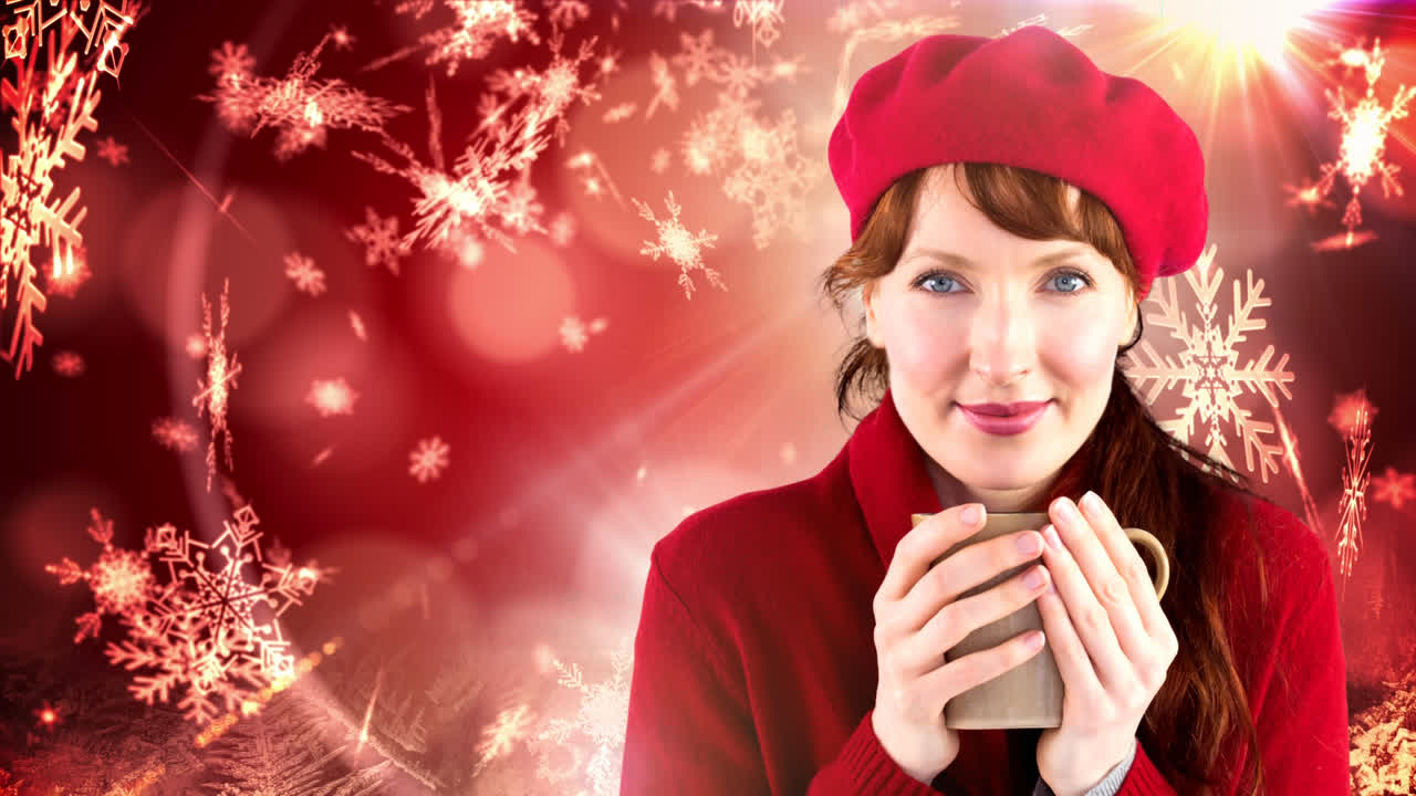 ⁇ 은 겨울 여자가 눈송이  ⁇ 에 컵을 마시고 있습니다.