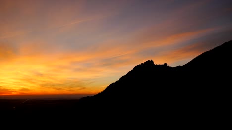 time lapse of sunrise over the flatirons in boulder, colorado