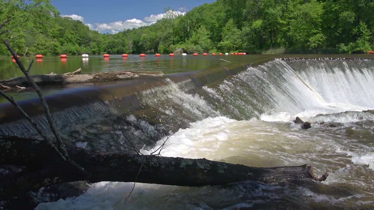 Time lapse from water falling down from dam