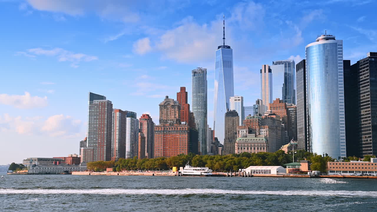 View on the beautiful architecture of New York, USA while travelling by the river. Cruise by the East River at daytime