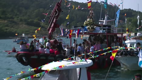 religious procession on boats