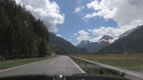 driving a car on austrian mountain roads in the inntal towards soelden, austria, europe