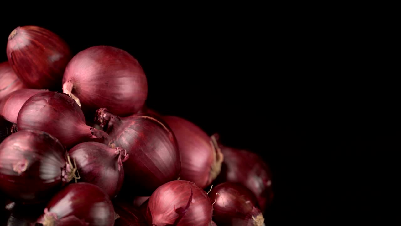 fondo de cebollas rojas giratorias